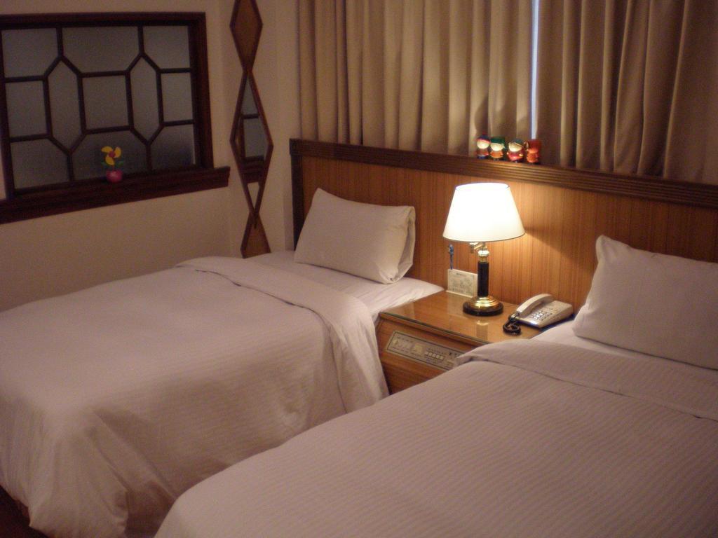 Emperor Hotel Kaohsiung Habitación foto